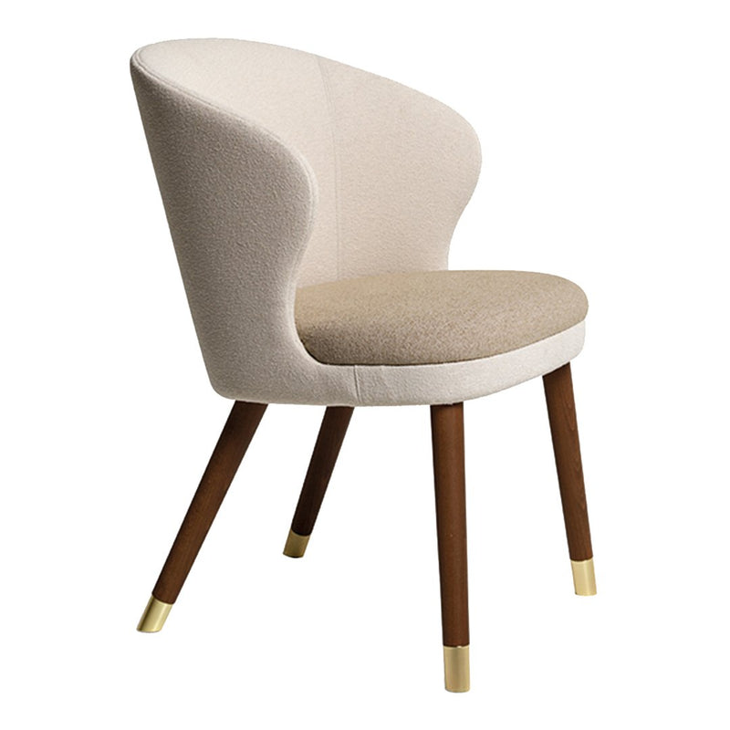 Beige and cream upholstered chair with wooden legs featuring gold accents. Modern design for elegant interiors.
