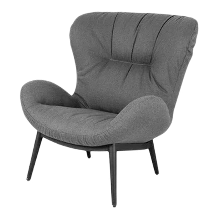 Soft gray upholstered armchair with a modern, curved silhouette and subtle stitching details against black legs.