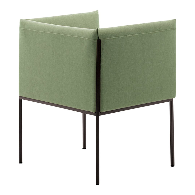 Green upholstered chair with a minimalist design and dark metal legs, featuring a smooth, solid fabric texture.
