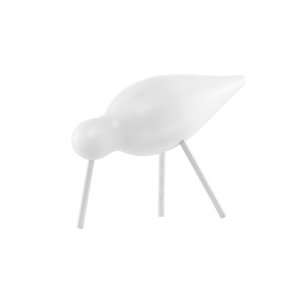 White decorative bird figurine with smooth surface and minimalist design, perfect for modern decor.