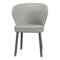 Light grey upholstered chair with smooth fabric, tapered black legs, and gold accents. Modern and minimalist design.
