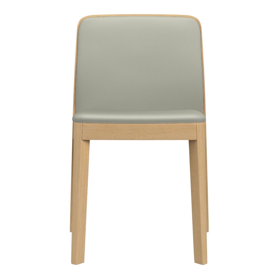 Mint green upholstered chair with natural wood legs, showcasing a minimalist design and a smooth finish.