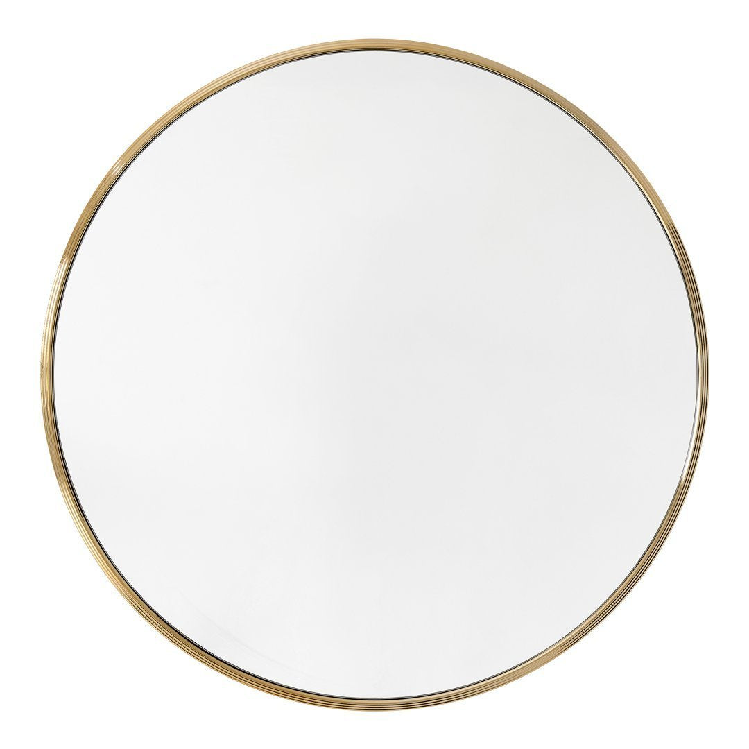 Round mirror with a sleek white surface and a shiny gold rim, perfect for modern decor.