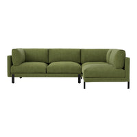 Green sectional sofa with a modern design and plush cushions, featuring a solid color and sleek black legs.