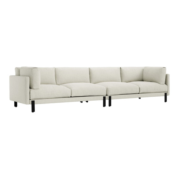 Light beige fabric sectional sofa with black legs, featuring a smooth, minimalist design and no visible patterns.
