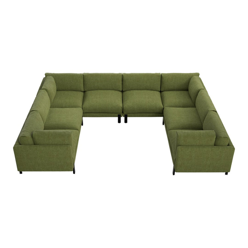 L-shaped green sectional sofa with a smooth fabric pattern and black legs, perfect for modern living spaces.