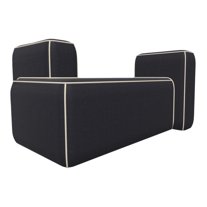 Black sofa with cream piping detail, featuring a modern, minimalistic design and geometric shape.