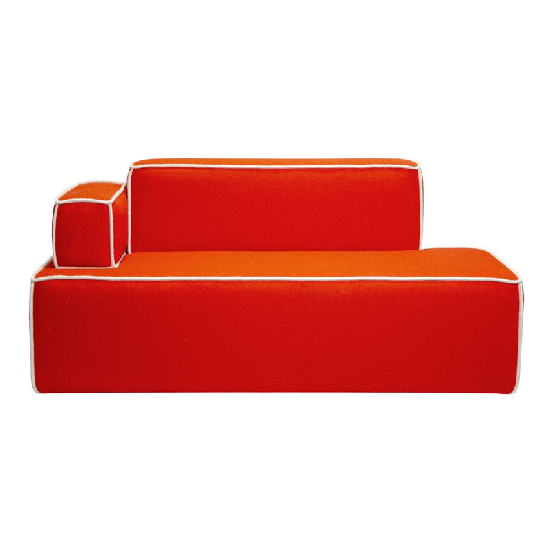 Vibrant red modular sofa with contrasting white piping and a bold orange cushion. Perfect for modern decor.