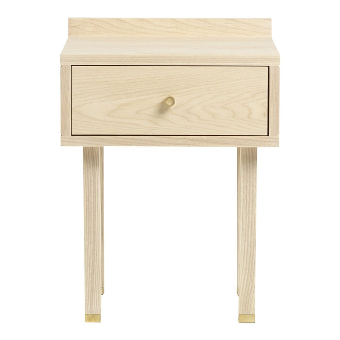 Light natural wood nightstand with a smooth finish, featuring a simple design and golden accents on the legs.
