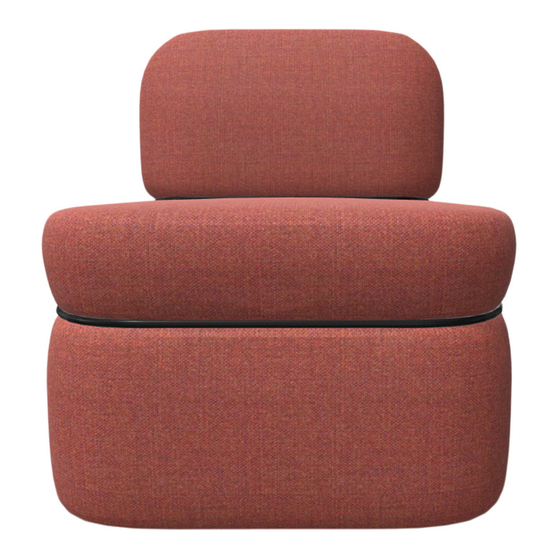 Soft, textured upholstery in muted coral, featuring a subtle heathered pattern. Modern and inviting design.