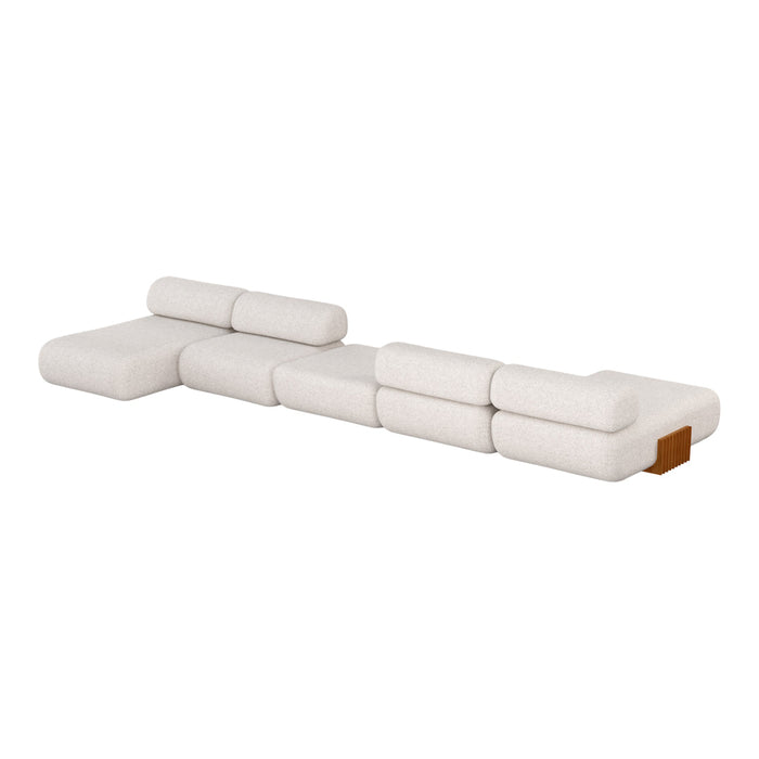 Light beige modular sofa with soft contours and a subtle textured fabric. Simple and modern design.