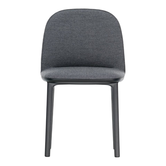 Gray upholstered chair with a smooth, minimalist design and sleek black legs, perfect for modern decor.