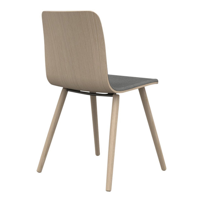 Light wood chair with a smooth, minimalist gray seat, featuring clean lines and natural textures.