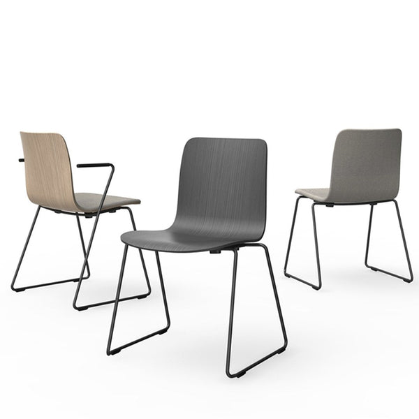 Three modern chairs featuring a beige, gray, and muted gray finish with sleek black legs.