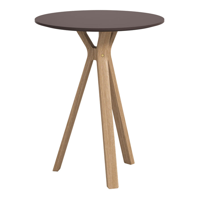 Round table with a dark brown top and light wood legs, showcasing a minimalist design and natural finish.