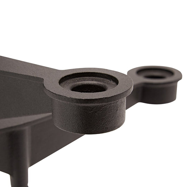 Black metal component with smooth surfaces and circular openings, featuring a matte finish for a sleek look.