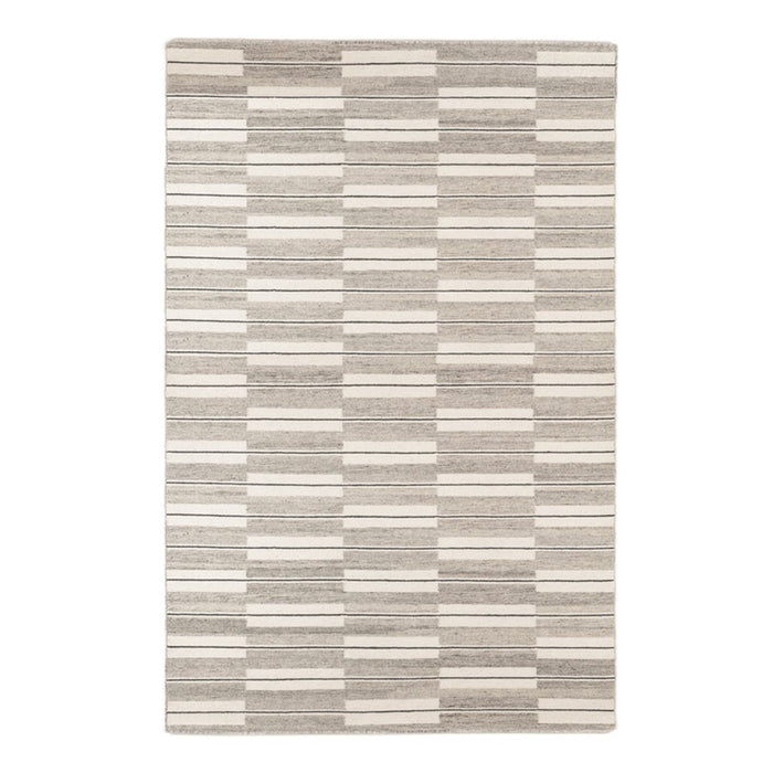 Light gray rectangular rug featuring alternating textured stripes and blocks in various shades of beige.