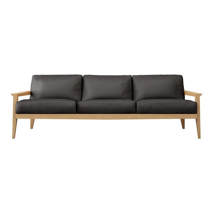 Black leather sofa with light wooden armrests and legs, featuring a modern, minimalist design.