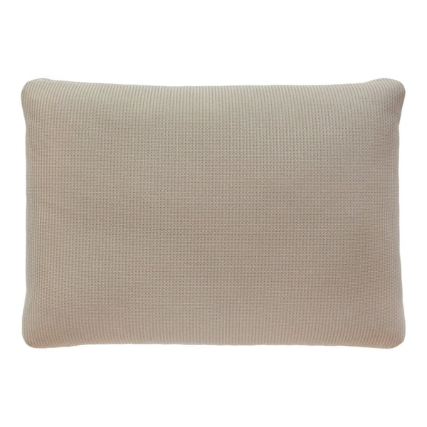 Light beige pillow with subtle ribbed texture, perfect for a cozy, minimalist decor.