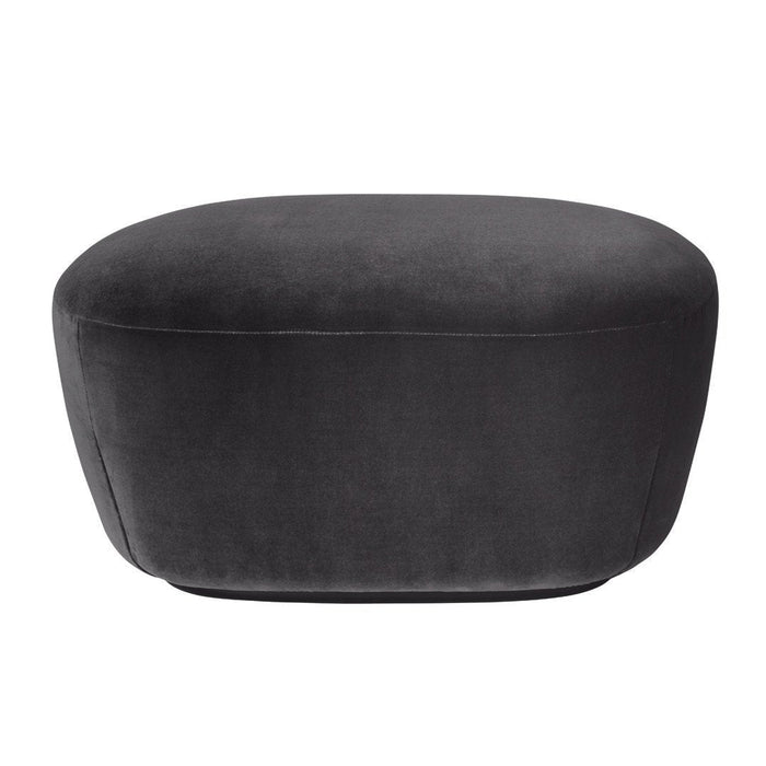 Plush oval ottoman in a deep charcoal gray, featuring a smooth, soft fabric for modern décor.