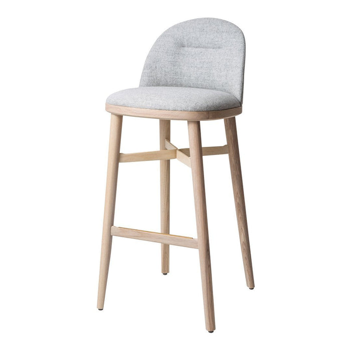 Light gray upholstered bar stool with natural wood legs and a sleek, minimalist design. Perfect for modern spaces.