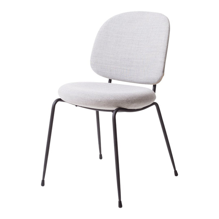 Light gray upholstered chair with a simple, minimalist design and sleek black metal legs.
