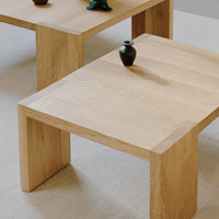 Natural oak coffee table with clean lines; warm wood tones and a minimalist design enhance any modern decor.