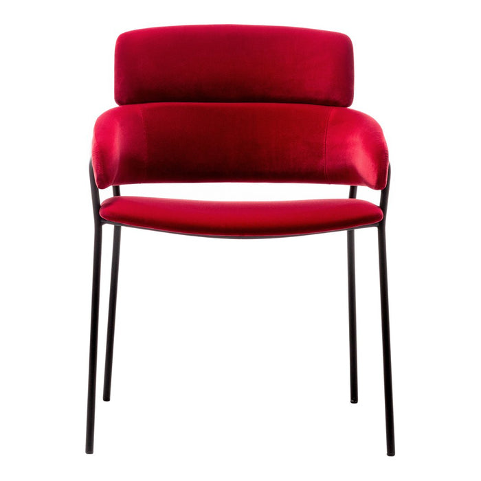 Luxury red velvet chair with a sleek black metal frame. Elegant modern design enhances any decor.