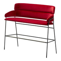 Red velvet bar stool with sleek black metal legs, featuring a minimalist design and elegant curved backrest.