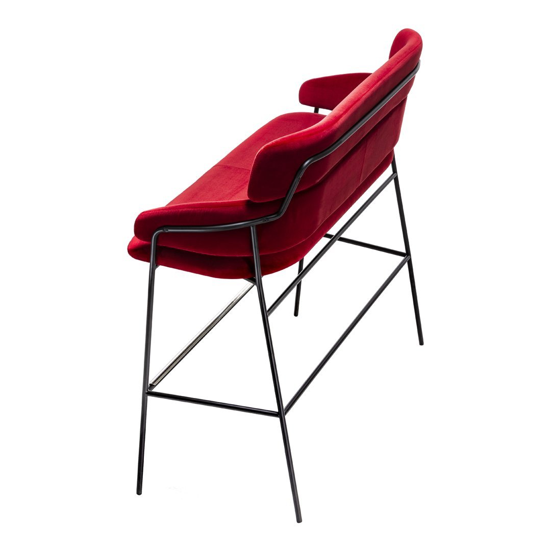 Red velvet bar chair with a sleek black metal frame and a modern minimalist design. Perfect for stylish interiors.