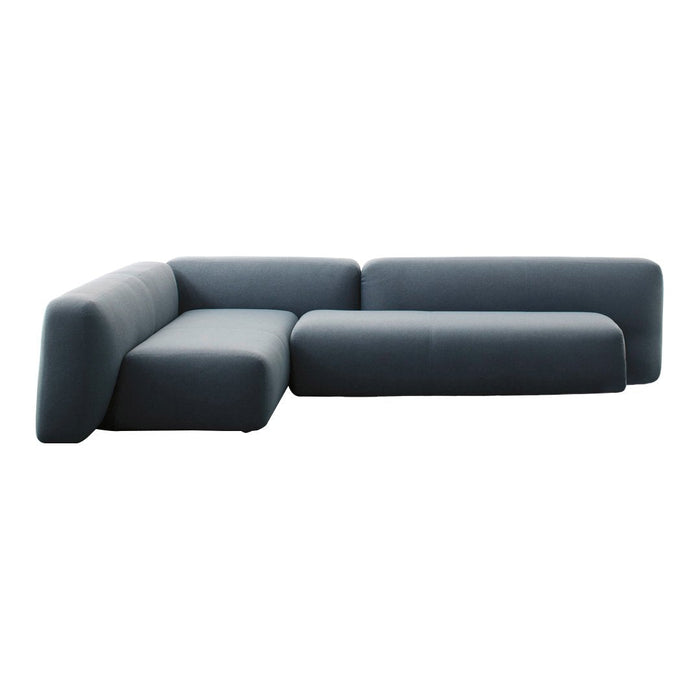 Modern sectional sofa in a sleek dark blue fabric with a smooth, minimalist design. Ideal for contemporary spaces.