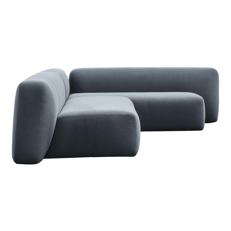 Modern grey sectional sofa with a smooth, minimalist design and rounded edges, perfect for contemporary decor.