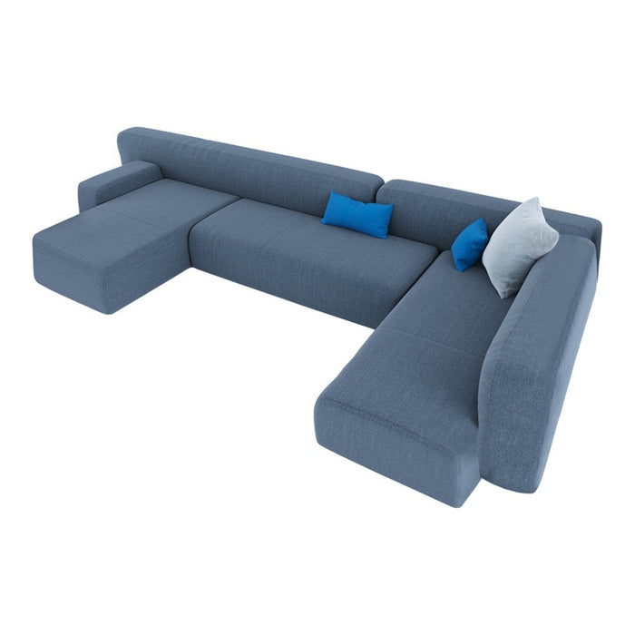 Dark gray sectional sofa with light blue and white accent pillows, featuring a modern, minimalist design.