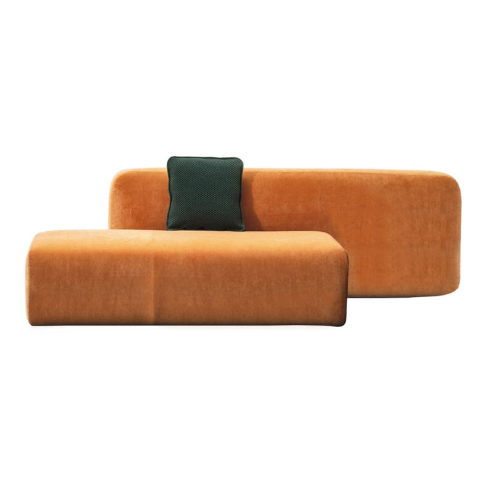 Orange modern sofa with smooth texture and a dark green accent pillow. Stylish, contemporary design for any living space.