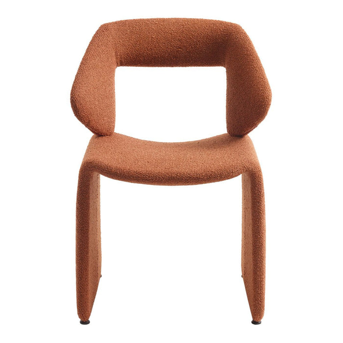 Stylish chair in warm orange hue with soft, textured fabric and modern, minimalist design. Perfect for any decor.