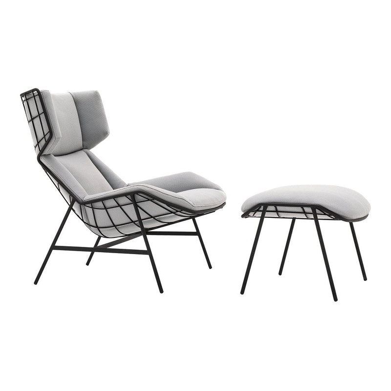 Gray and white accent chair with a geometric black wire frame and matching ottoman. Modern minimalist design.