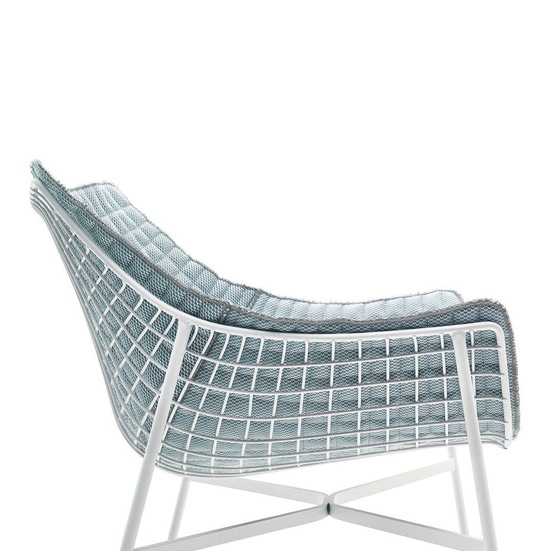 Blue grid-patterned chair with a soft texture, featuring a sleek white frame. Perfect for modern interiors.