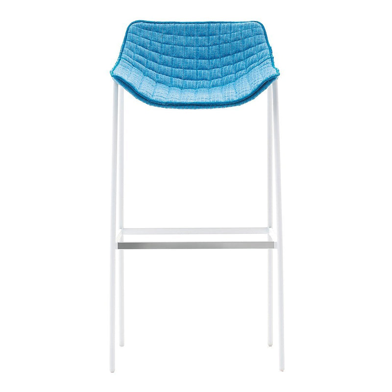 Blue quilted bar stool with a sleek white metal frame, perfect for modern decor.