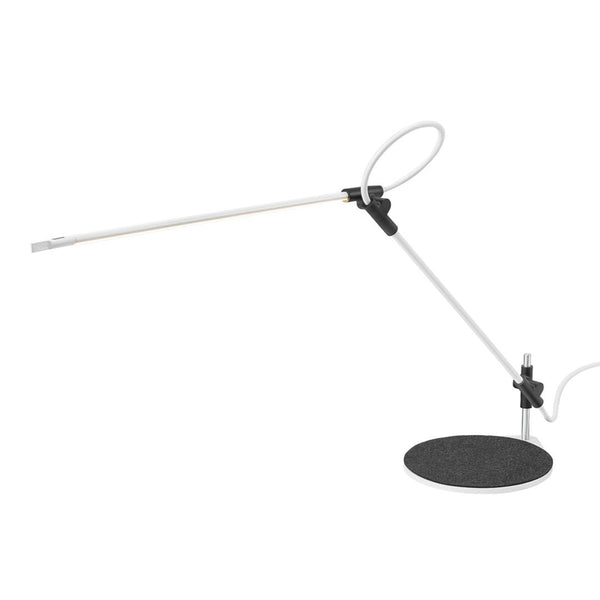 White and black modern desk lamp with a sleek circular base and minimalist design. Ideal for contemporary spaces.