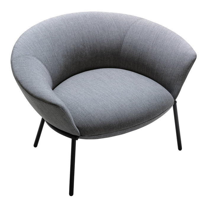 Gray upholstered lounge chair with a curved design and sleek black metal legs. Simple, modern, and stylish.