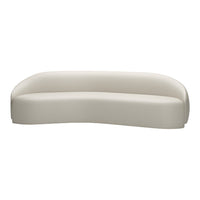 Beige curved sofa with smooth, minimalist design and seamless upholstery for a modern aesthetic.