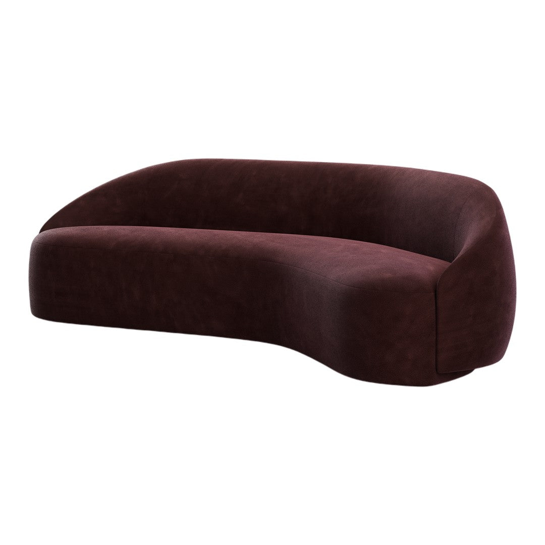 Burgundy curved sofa with a smooth, suede-like texture, perfect for modern interior decor.