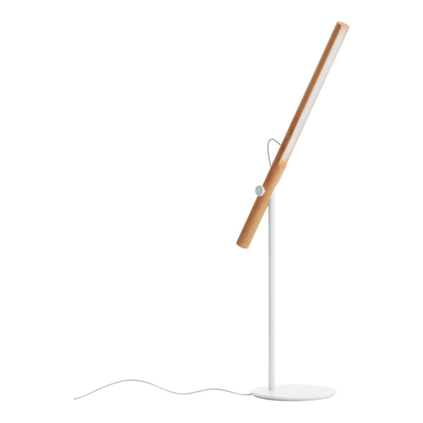 Modern desk lamp with a light wood finish and a sleek white base, showcasing a minimalist design.