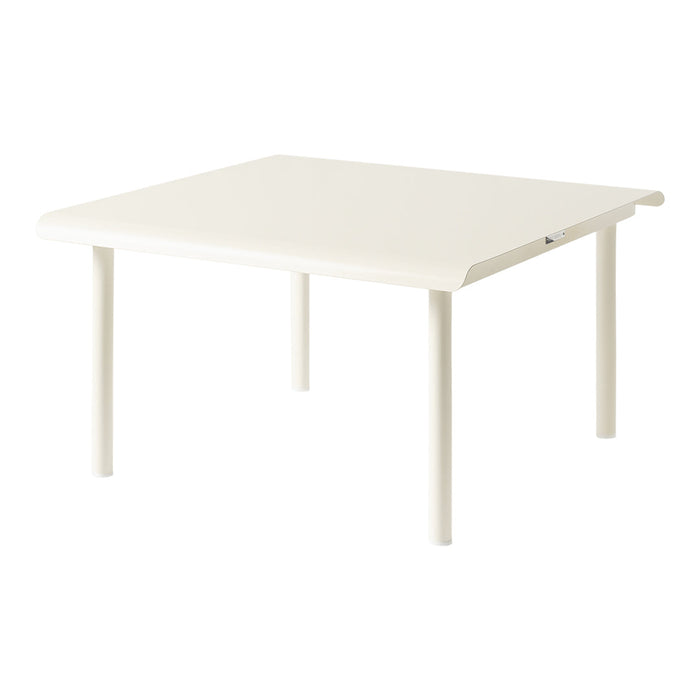 Square white table with a smooth surface and curved edges, featuring four sturdy legs. Perfect for minimalist decor.