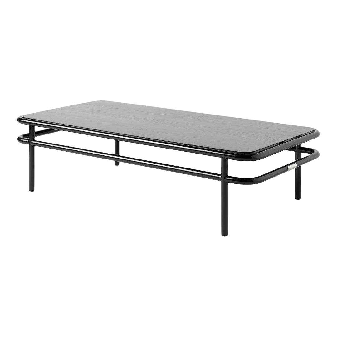 Black rectangular coffee table with a smooth surface and minimalist metal legs, showcasing a sleek, modern design.