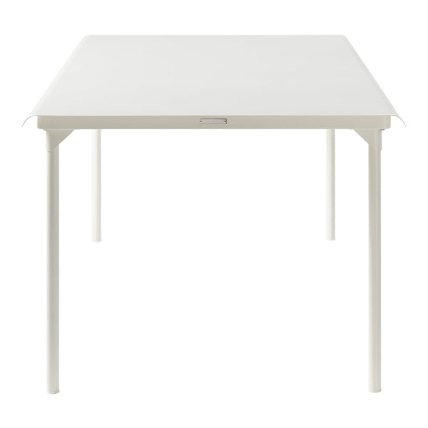 Minimalist white dining table with clean lines and a smooth surface, perfect for modern interiors.