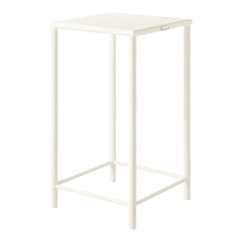 White bar stool with a textured top and sleek legs, perfect for modern decor. Ideal for indoor and outdoor use.