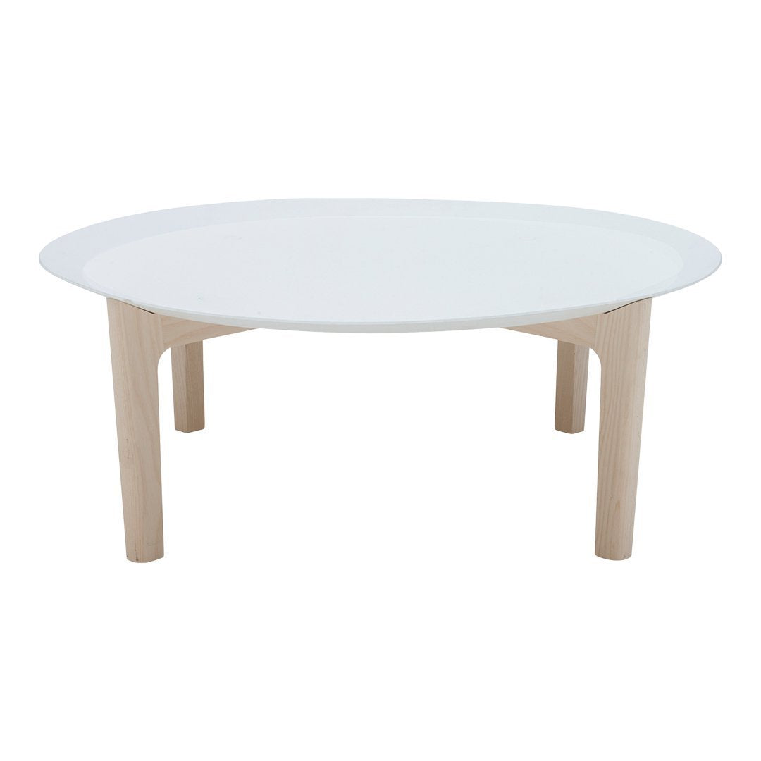 Round coffee table with a sleek white top and natural wood legs, showcasing a minimalist design with a modern aesthetic.