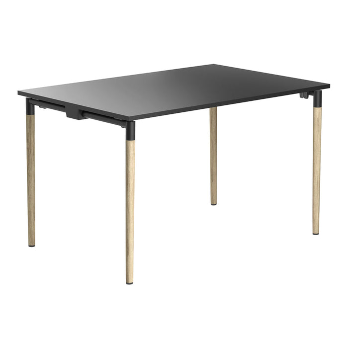 Rectangular table with a sleek black surface and natural wood legs, perfect for modern decor.