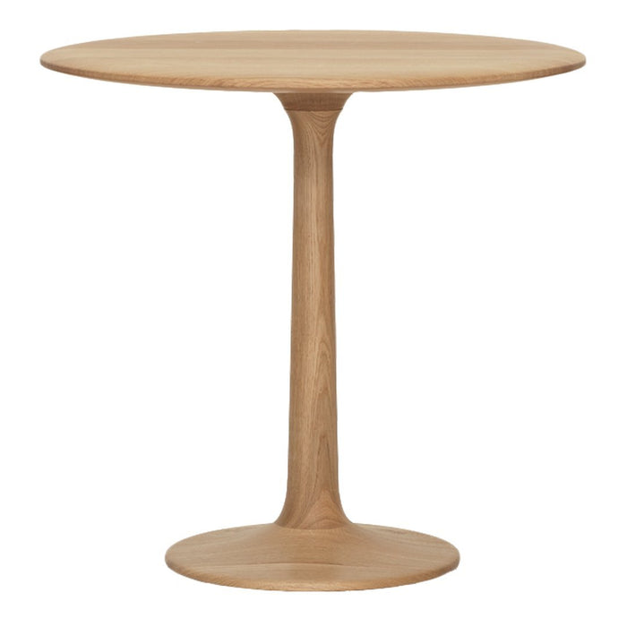 Round wooden table in light oak finish with a smooth, minimalist design and a single pedestal base.